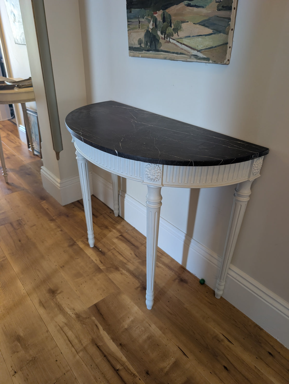 Louis XVI style half moon console table with Marble top.