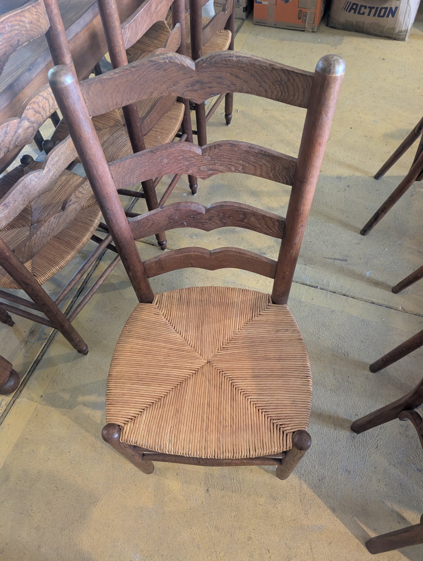 Set of 10 provincial ladder-back chairs