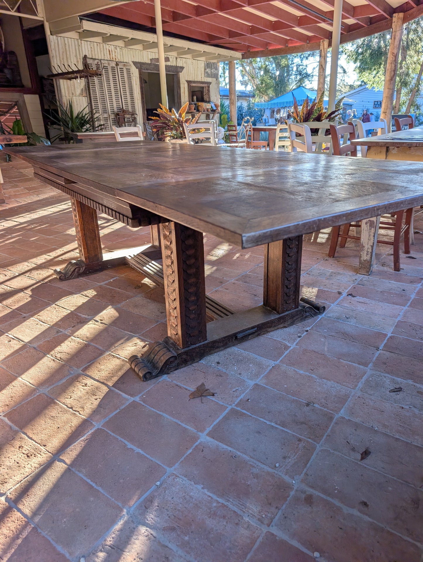 Renaissance style oak table with extensions
