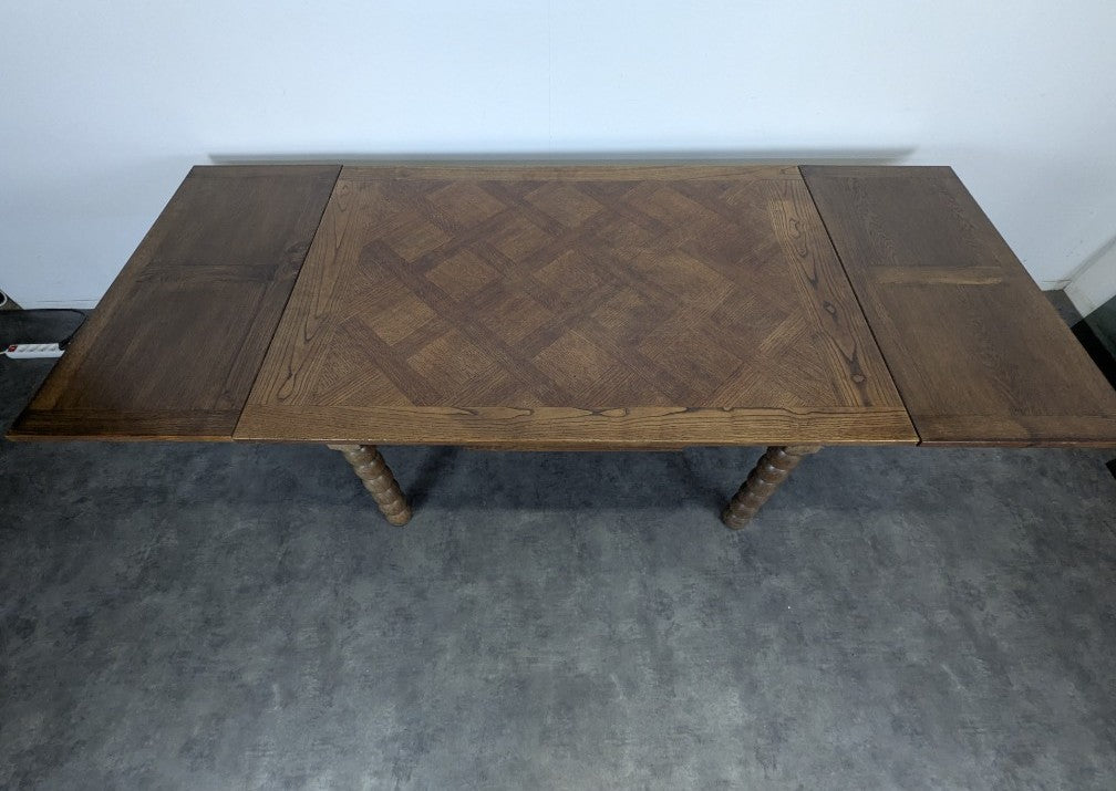 Oak Dining table with spool legs with two extensions
