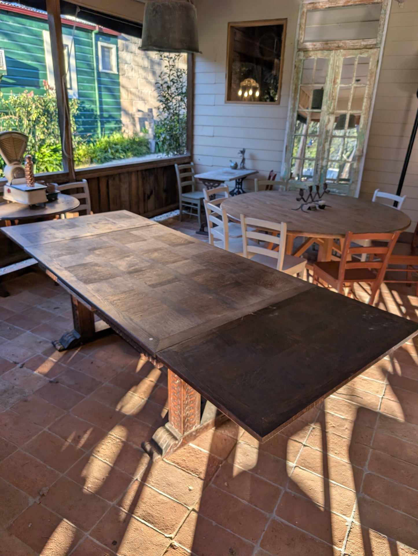 Renaissance style oak table with extensions