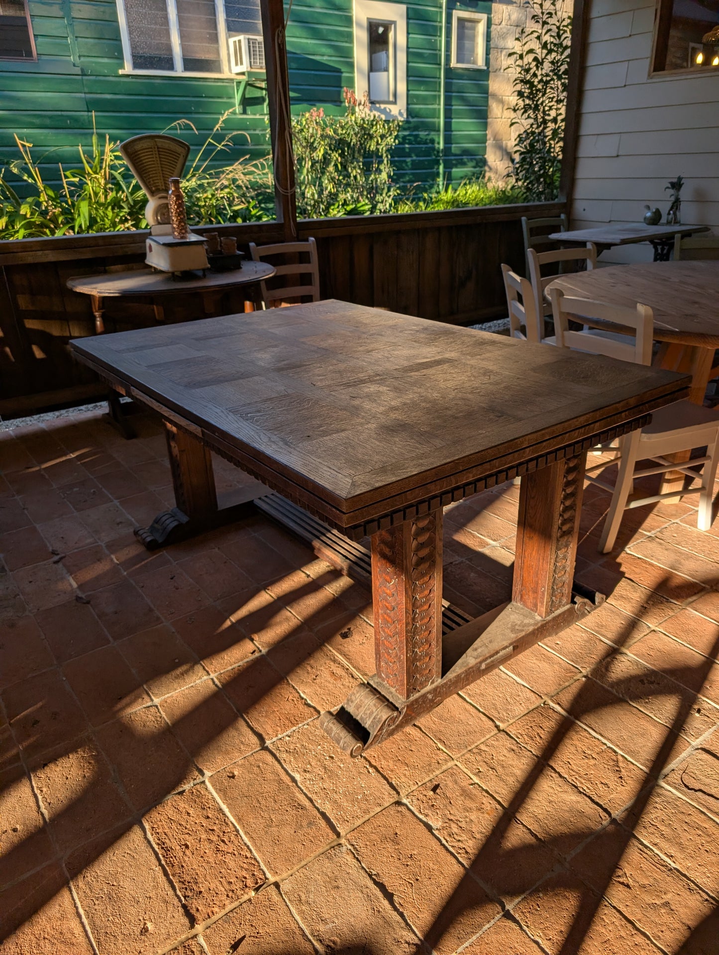 Renaissance style oak table with extensions