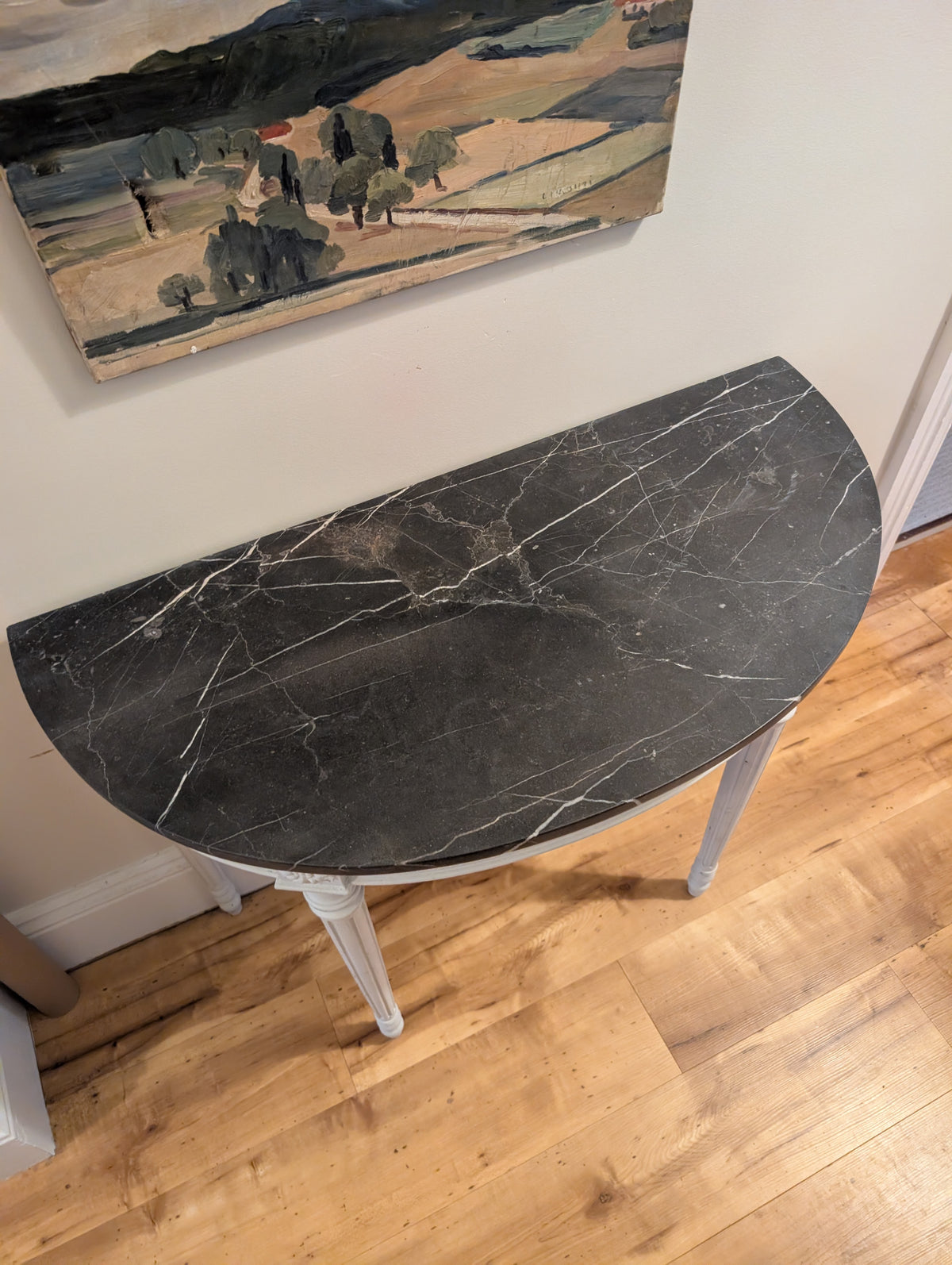 Louis XVI style half moon console table with Marble top.