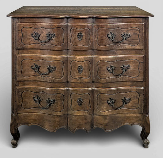 Neo-rustic Louis XV style crossbow chest of drawers in oak
